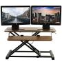 TechOrbits Standing Desk - Stand Up Desk Converter and Monitor Riser - Height Adjustable Sit Stand Tabletop Workstation Wood Brown