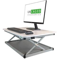 CHANGEdesk MINI small standing desk converter simple affordable adjustable height desktop riser for laptops single computer monitors portable compact lightweight ergonomic sit stand up tabletop stand
