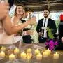 Battery Flickering Tea Lights with Timer, Punasi Set of 12 Battery Operated LED Realistic Electronic Flameless Candles with Fake Candle Wicks for Home Room Party Wedding Decor - Warm White